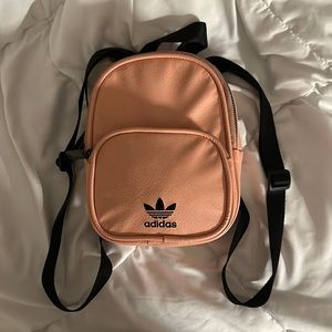 pink embroidered adidas mini backpack